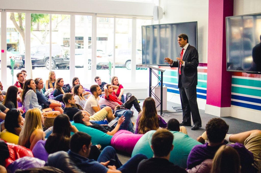 Tim Draper, legendary investor & founder of Draper University, mentoring future startup leaders.